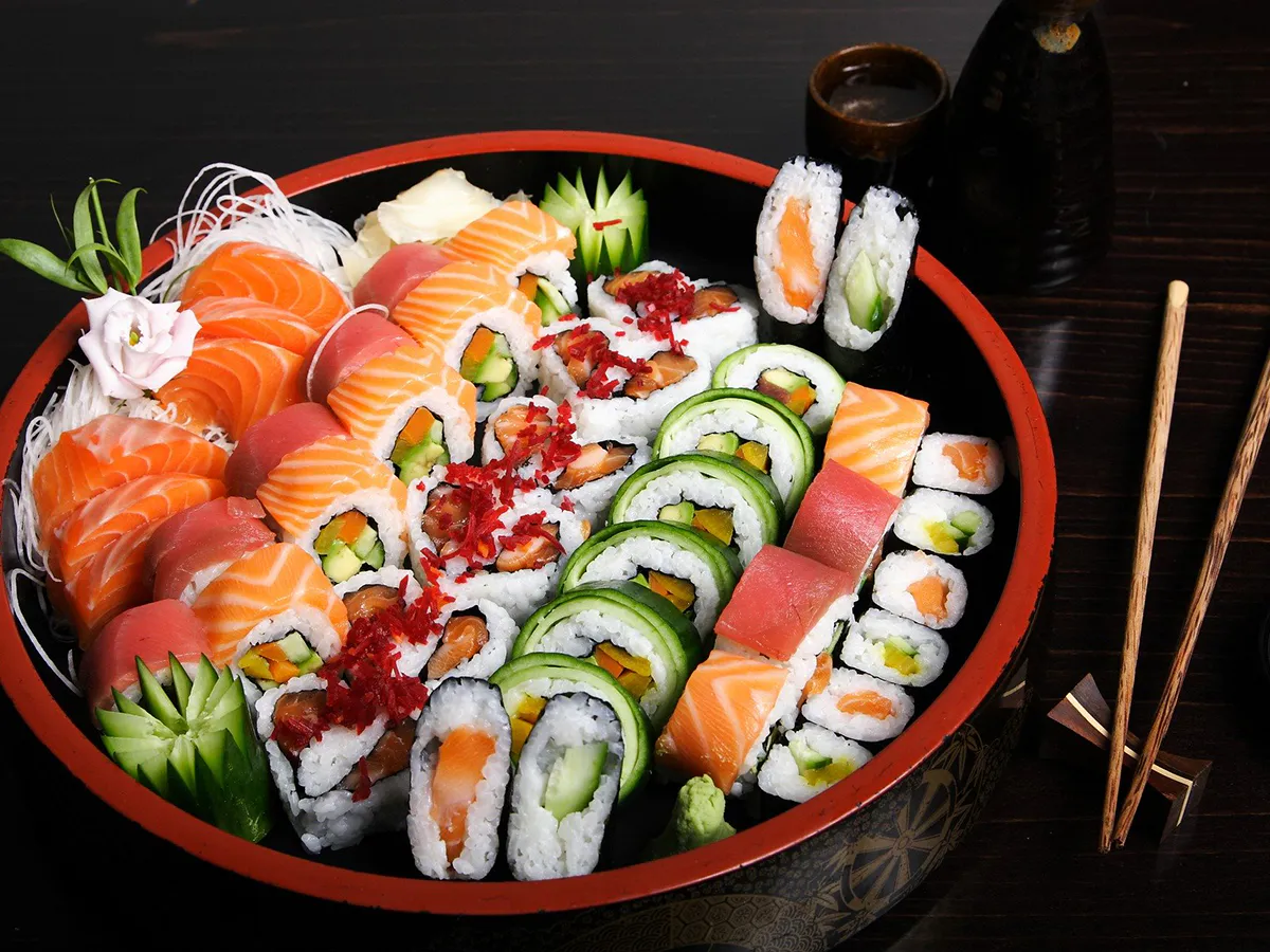 Large assorted sushi platter with fresh sashimi and maki rolls at Love Sushi, a Japanese Restaurant in Thornton