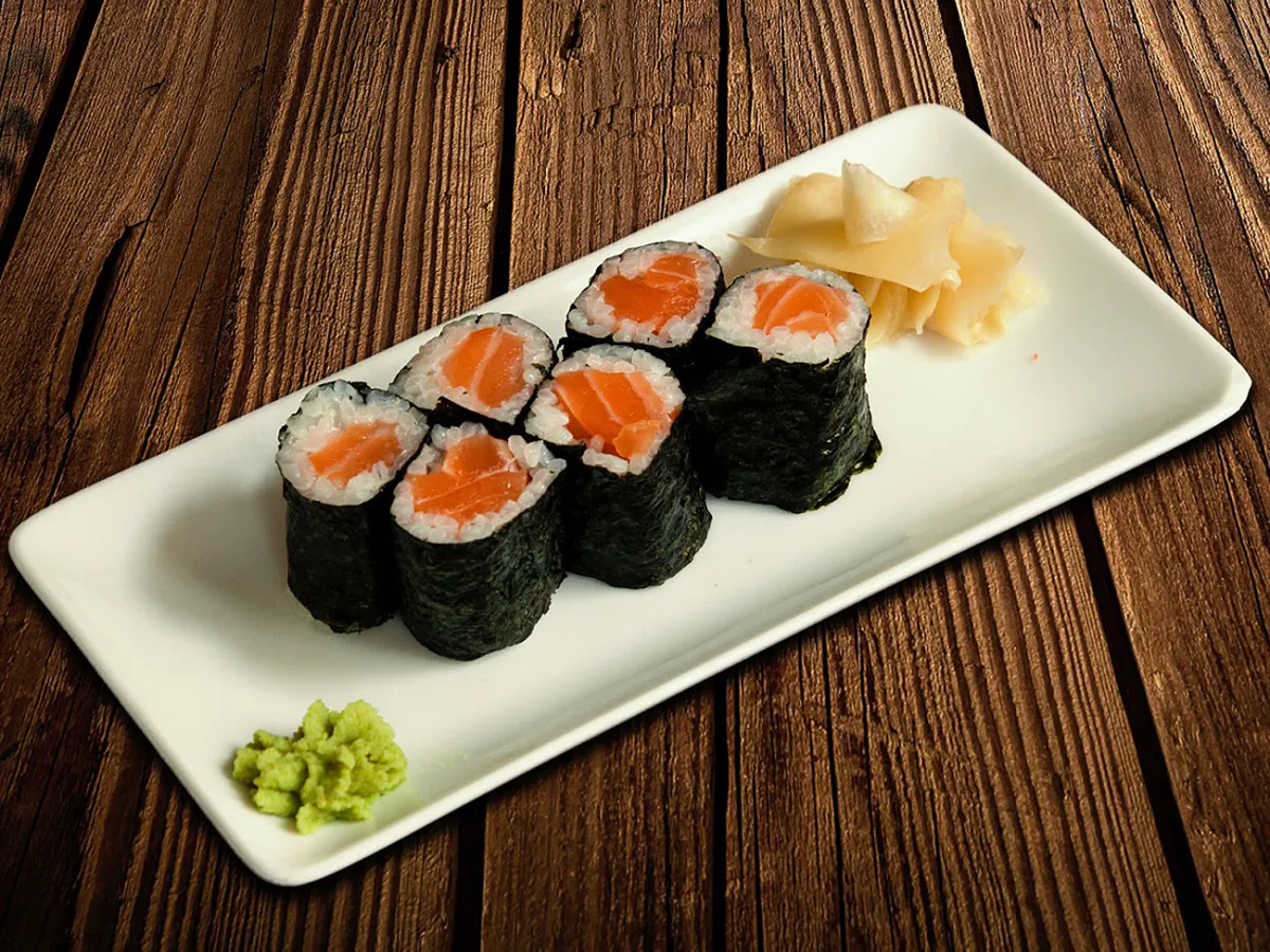 Salmon maki sushi rolls with wasabi and pickled ginger at Love Sushi, a Japanese Restaurant in Thornton
